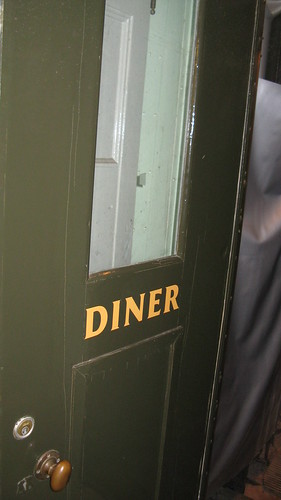 The vestibule entry door of a preserved 1920's era Louisville & Nashville Railroad dining car. The Illinois Railway Museum. Union Illinois. Friday, July 3rd  2009.