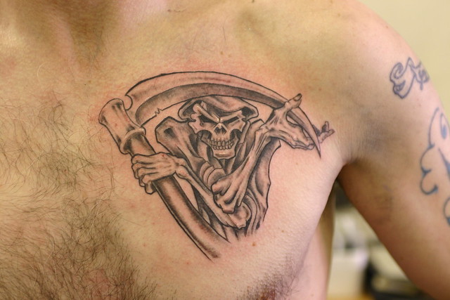 Grim reaper tattoo on chest. Tattooed by Johnny at;. The Tattoo Studio