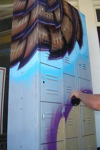 Blake Foster painting lockers for the gallery!