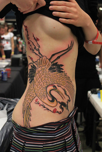 Tattoos Bird at Women Right Side Body