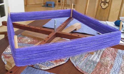 Purple yarn on swift