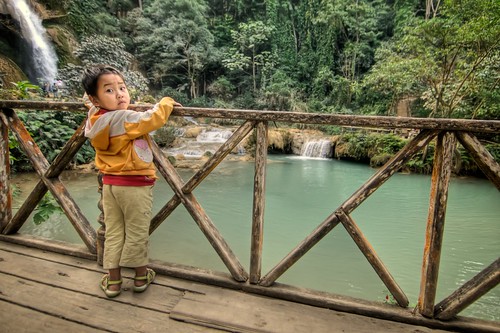 Kid at Kuang Si Waterfall