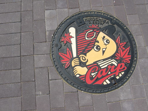 Hiroshima Carp-themed manhole cover.