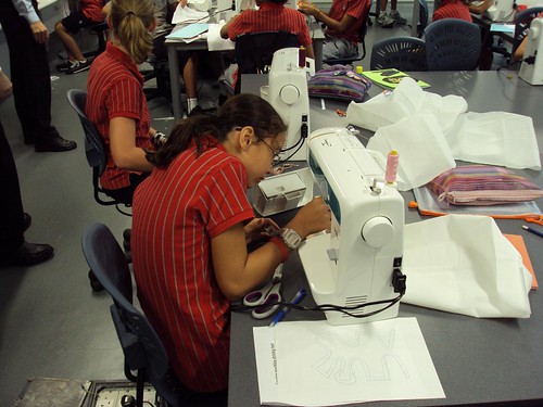 Student sewing at Discovery College (Hong Kong)