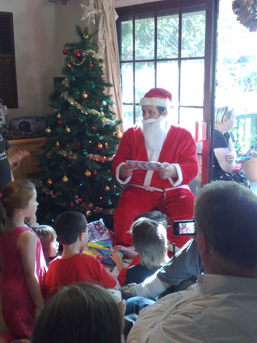 Santa handing out the pressies