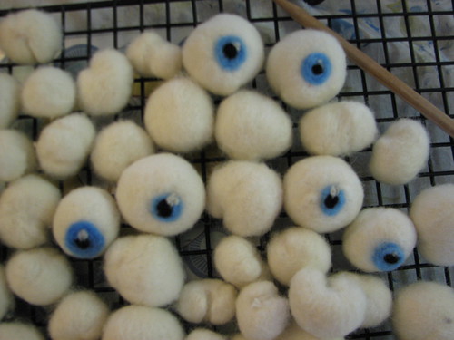 with needle felted iris and pupil