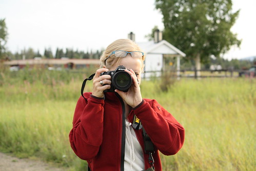 Beth taking pictures by you.