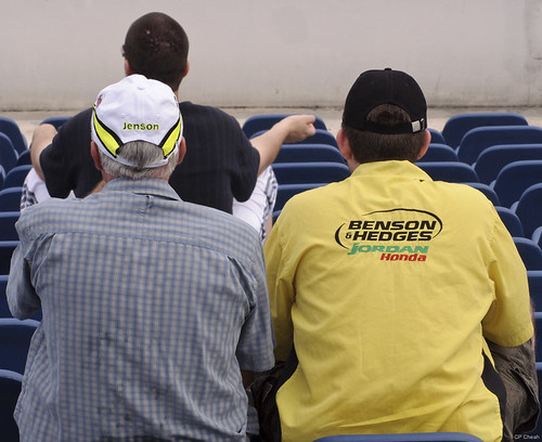 honda fan 2009. The F1 fan on the right is wearing a shirt with the logo of a former F1 team, Jordan Honda, which eventually became Force India. Honda supplied engines to