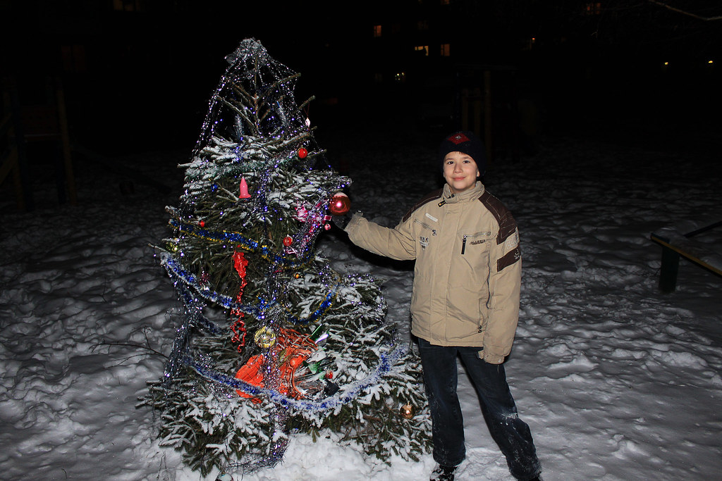 Joshua with a New Year Tree