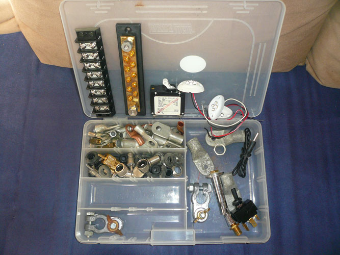 electrical spares-lugs of all sizes, battery clamps, circuit breaker, spare led lighting (actually those have been used now and are not included), busbars, etc