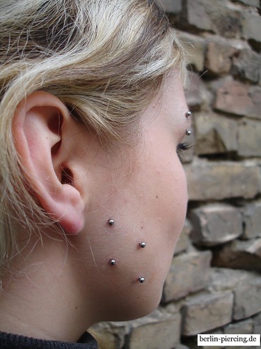 surface piercing corset. Surface Piercing by Piercing