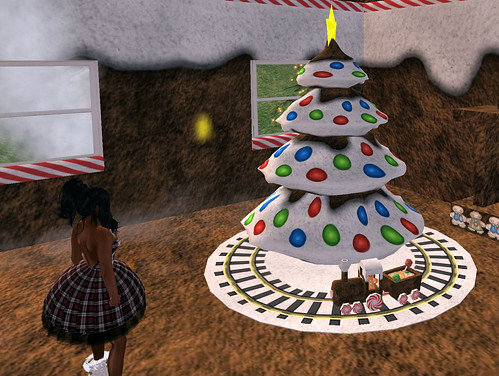 Crossroad Dreams Gingerbread train and tree inside the Gingerbread house