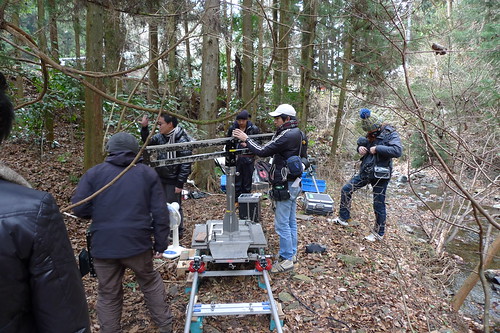 Me setting up a shot in the forest
