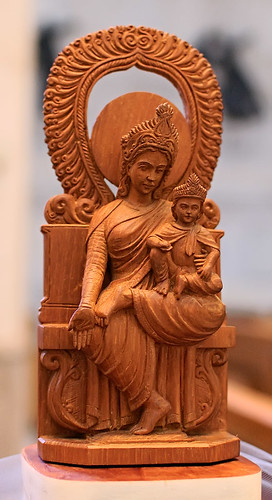 Sandalwood, "Woman Enthroned", made in India, from the collection of the Marianum, photographed at the Cathedral of Saint Peter, in Belleville, Illinois, USA