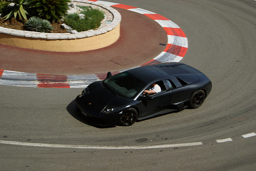 A matte black Lamborghini Murci lago LP640 driving around in Monaco 