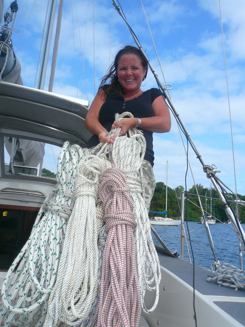 Marge trying to hold up some of the spare lines and halyards!