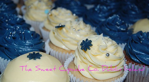 Navy and ivory cupcakes for a wedding