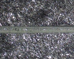 No.1.1-diorit pyroxenicky,cierny,6xrezanypovrch vystiepany-50x200 - detail