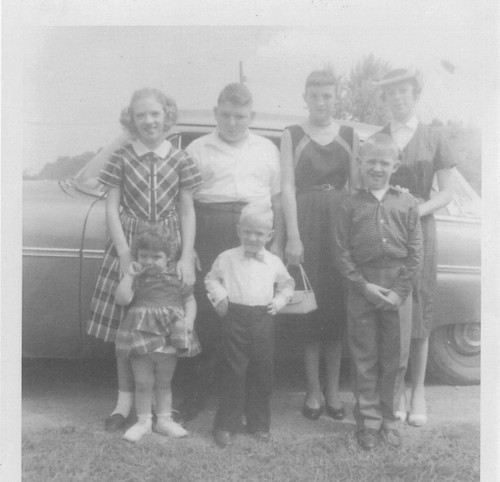 The McGinnis Kids. (Back Row Left to Right) Aunt Evelyn, Uncle Dale, Aunt Donna, Aunt Dortha (Front Row Left to Right) Aunt Debbie, Dad, Uncle Mac