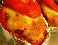 Baked beef tomatoes with bolognaise rizoni