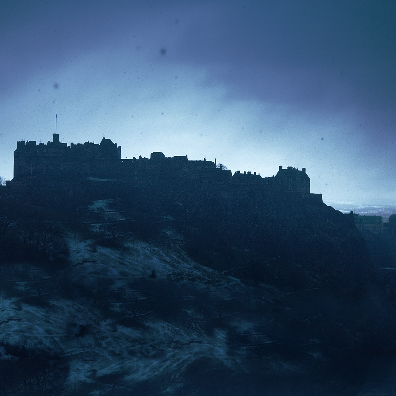 snow over Edinburgh castle