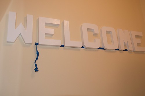 Hanging the &quot;WELCOME&quot;