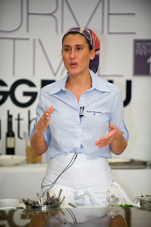 Paola Carosella giving a cooking demonstration at the Four Seasons Bangkok's World Gourmet Festival