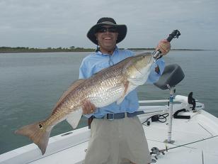 Guy Mathews caught this 40" Redfish on a Loomis Greenwater in the Lower Laguna Madre in deep South Texas. He came back for the anchor after chasing down the fish! 