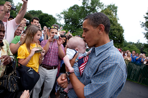 barack obama pictures baby. President Barack Obama kisses