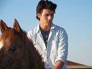 joe jonas on a horse by Random_Jonas (Sarah).
