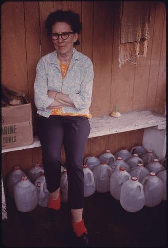 Alice Thompson, Besoco, West Virginia, Is Shown with Milk Bottles Her Neighbors Furnish Her Water with after Her Water Lines Were Cut Off. She Is Divorced From a Coal Miner Who Was Imprisoned for Killing a Man 04/1974