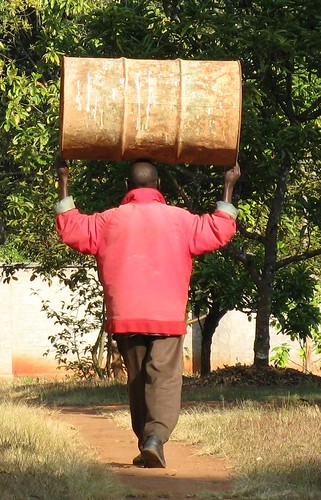 Man Carrying Drum