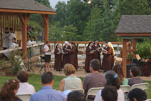 Outdoor novena at the Discalced Carmelite Novena, in Ladue, Missouri, USA - nuns singing
