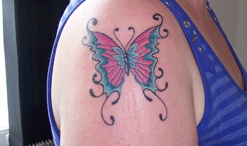 butterfly tattoo. pink butterfly