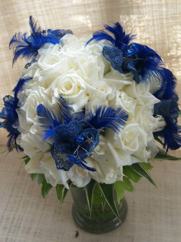 ecofriendly bridal bouquet Their colors are silver white and blue