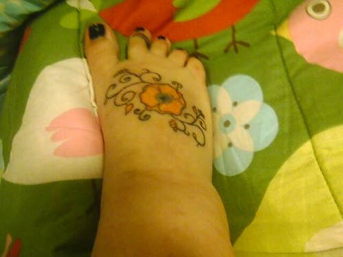 poppy tattoo. swirl tattoo