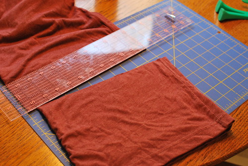 Cut the t-shirt using scissor or a rotary cutter