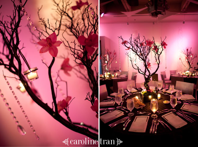 The centerpieces were manzinita branches adorned with pink orchids 