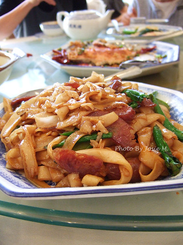 stirred fried flat noodles with sausage
