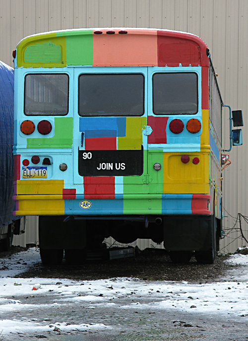 multicolored bus in a snowy parking lot, Ketchikan, Alaska