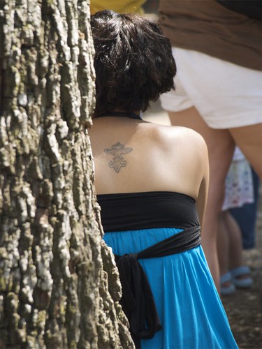 Female Cross Back Tattoo