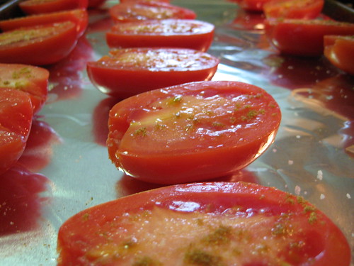 roma tomatoes on baking sheet