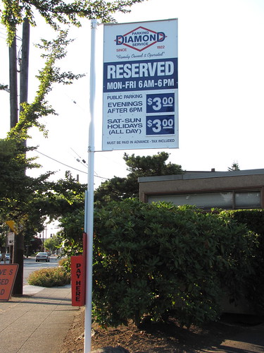In anticipation of increased demand for parking near the station, this formerly-free parking lot has sprouted a brand-new Diamond Parking sign.