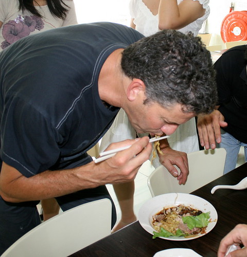 Bob trying out bak chor mee (minced meat noodles)
