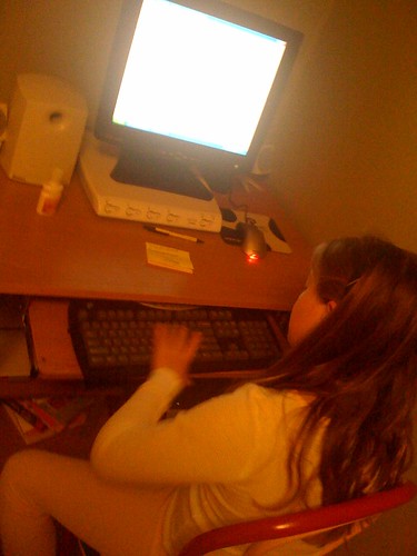 Taylor typing up her blog