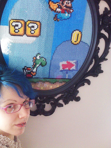 Finished the Mario cross stitch and hung it in the living room!