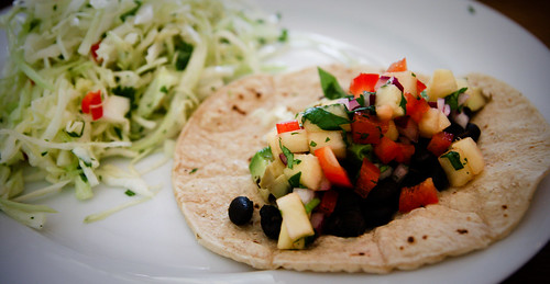 Black bean taco with pineapple salsa and cabbage salad