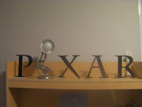 pixar logo font. dresses the Pixar logo in