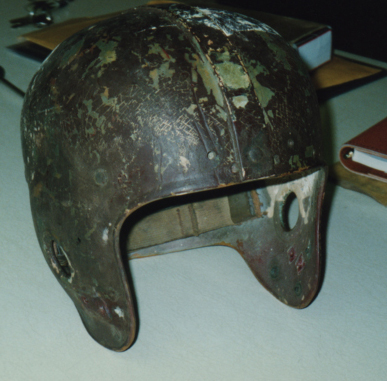 Image result for beat up football helmet