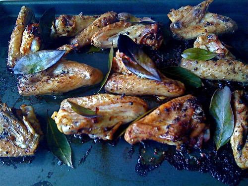 chicken wings with lemon, black pepper and bay leaves